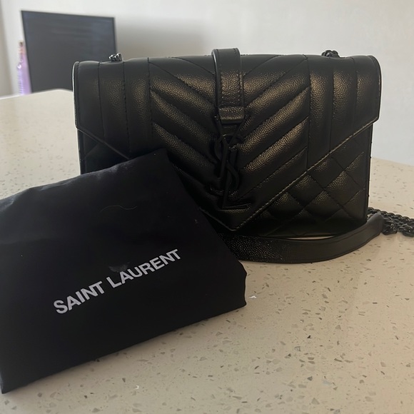 Saint Laurent cross body bag. Lightly used in mint condition. - Picture 1 of 2